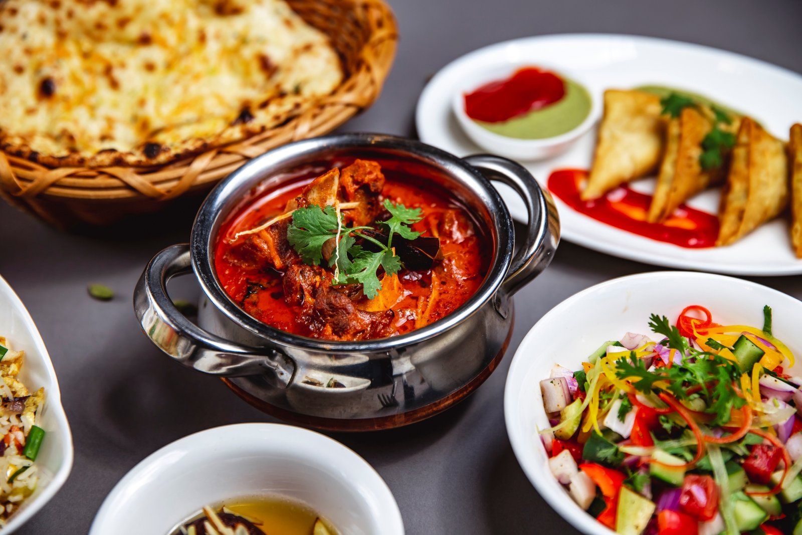 Traditional Punjabi cuisine served with rich curries, tandoori dishes, and fresh naan bread